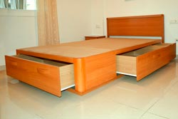 imagen cama de madera con cajones plus