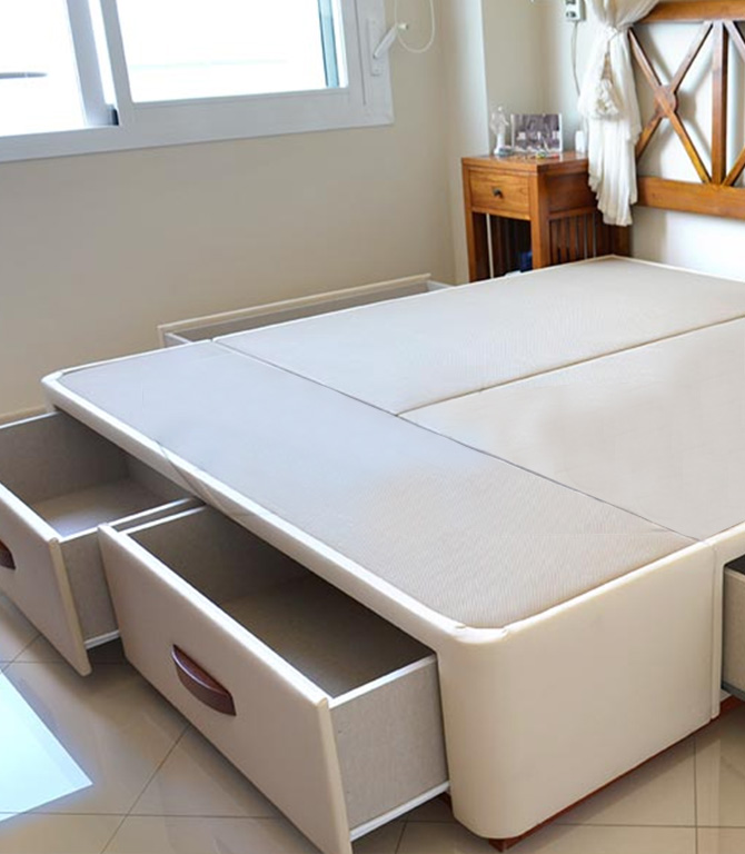 vista de cama con cajones tapizada de muebles que idea